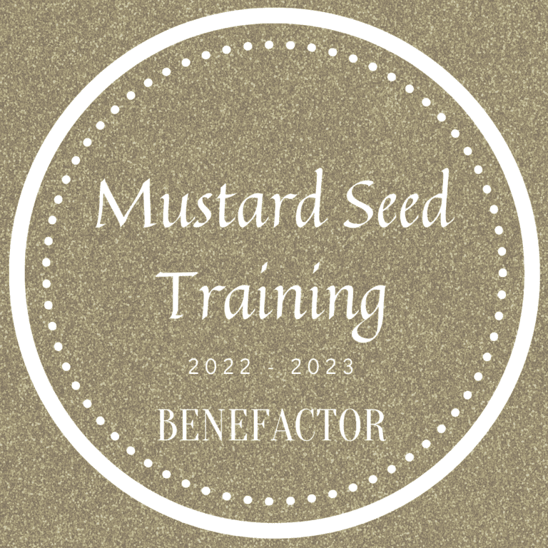 a badge that says mustard seed training.