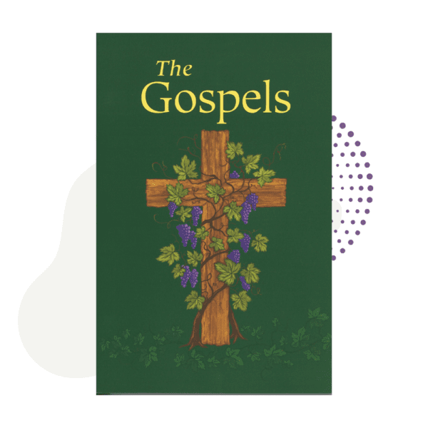 A copy of The Gospels with a cross and vines on it.