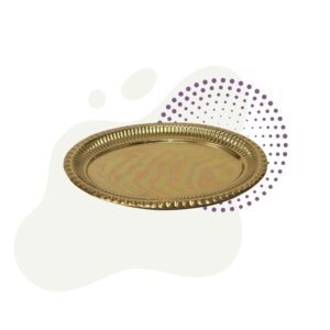 a gold tray with dots around it.