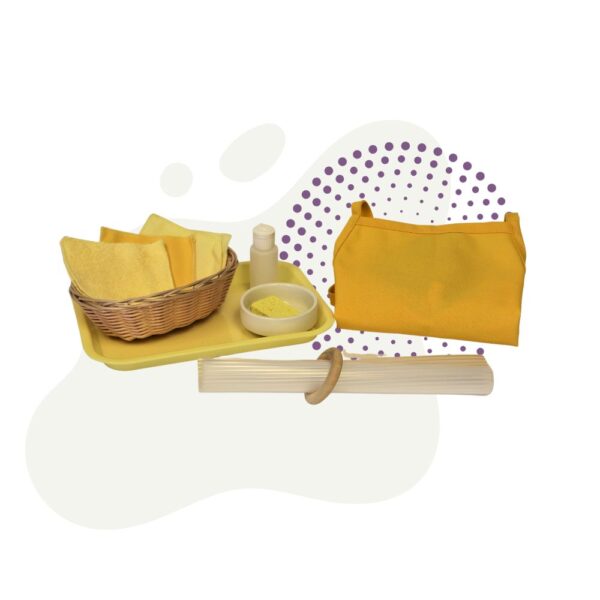 a tray with a yellow cloth and a basket with Metal Polish.
