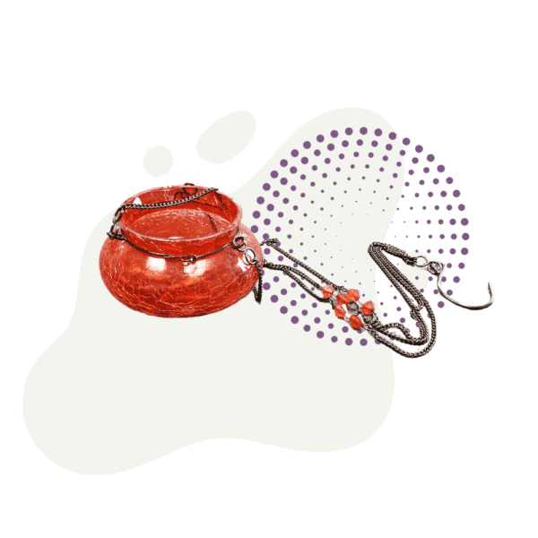 A red bowl with a rope attached to it.