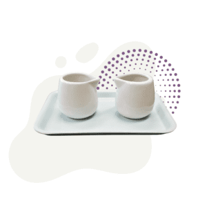 Two saucers on a tray with a purple background.